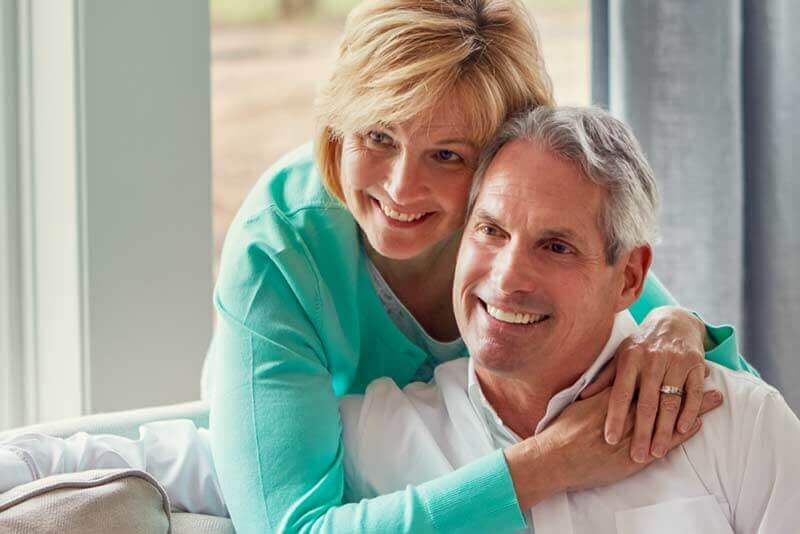Man and Woman who have received periodontal therapy